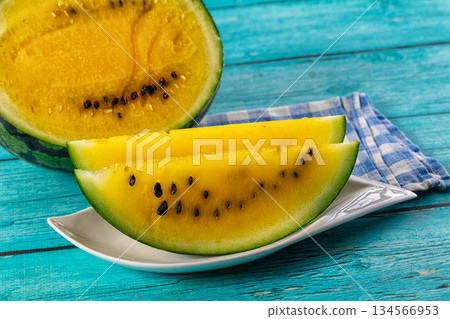 Ripe sweet juicy yellow watermelon Ripe sweet juicy yellow watermelon 134566953