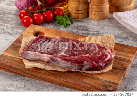 Gourmet raw rib eye steak 134567024