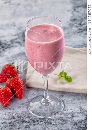 Strawberry smoothie milk shake glass 134567071