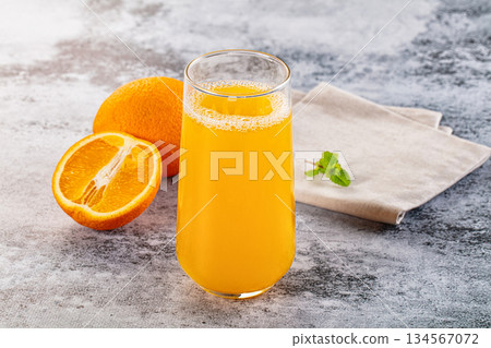 Fresh orange juice in the glass 134567072