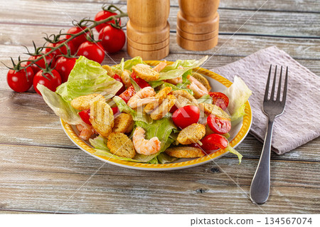 Caesar salad with prawn and romano 134567074