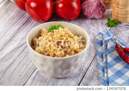 Vegan cuisine - boiled bulgur garnish 134567076
