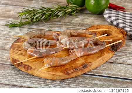 Raw shrimp skewer for grill Raw shrimp skewer for grill 134567135