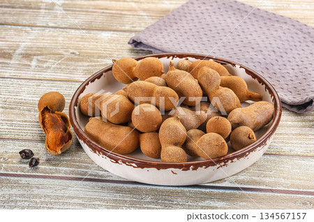Tropical exotic Tamarind fruit heap 134567157