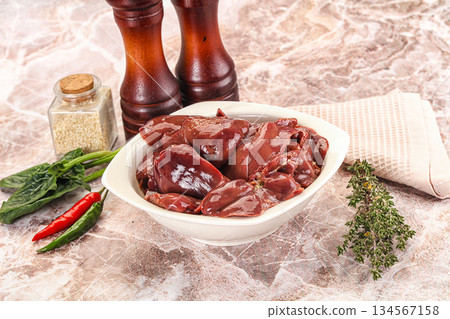 Raw uncokked chicken liver in the bowl Raw uncokked chicken liver in the bowl 134567158