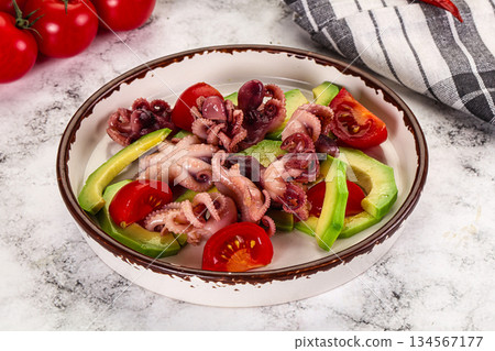 Salad with baby octopus and avocado 134567177