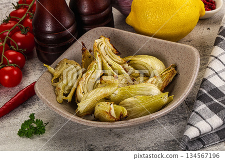 Vegan cuisine - baked fennel with oil Vegan cuisine - baked fennel with oil 134567196