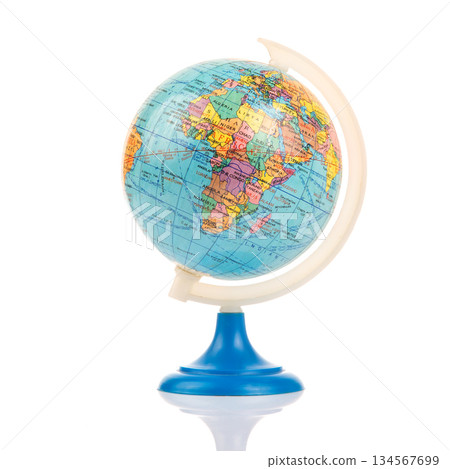 Globe showing geographical features of Africa on colorful map with stand 134567699