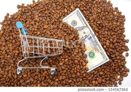 Coffee trade and economy depicted with a mini shopping cart, roasted coffee beans, Coffee trade and economy depicted with a mini shopping cart, roasted coffee beans, 134567868