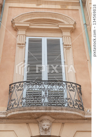 Elegant balcony on historic European building facade. Architectural detail., Siena, Italy.  134569818