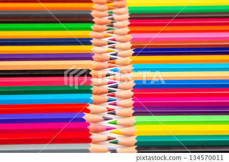 Colorful array of pencils arranged neatly in a vibrant display for artistic inspiration Colorful array of pencils arranged neatly in a vibrant display for artistic inspiration 134570011