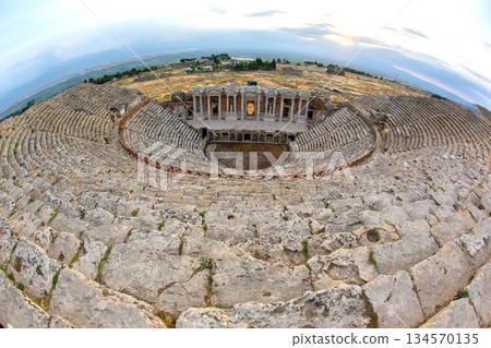Discover ancient history at the stunning amphitheater in Hierapolis, Turkey during sunset Discover ancient history at the stunning amphitheater in Hierapolis, Turkey during sunset 134570135