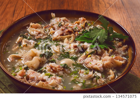 Muzhuzhi, a Georgian dish made from pork legs, with spices and herbs, homemade 134571075