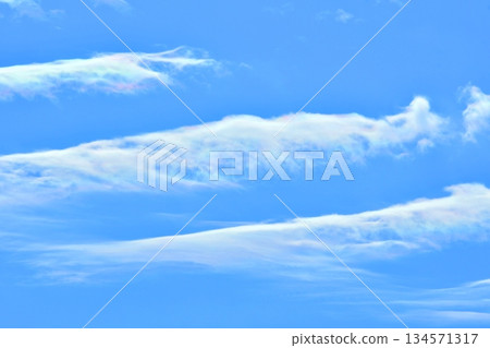 Wave clouds flowing in the blue sky (photo by fix) Wave clouds flowing in the blue sky (photo by fix) 134571317