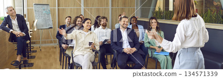 Teamwork business people in office strategizing company's next steps for growth. Focus is on effective teamwork pooling skills to innovate and drive business forward Together teamwork brainstorm. 134571339