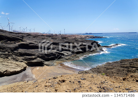 Rocky Tenerife coast around Montana Bocinegro and Montana Roja mountain, near El Medano, Canary Islands, Spain, sunny summer day Rocky Tenerife coast around Montana Bocinegro and Montana Roja mountain, near El Medano, Canary Islands, Spain, sunny summer day 134571486