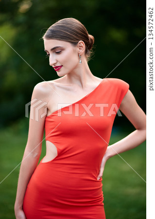 Elegant Slavic Woman in Red Dress Outdoors 134572462