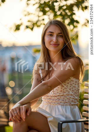 Slavic Woman in White Dress at Golden Hour Slavic Woman in White Dress at Golden Hour 134572464