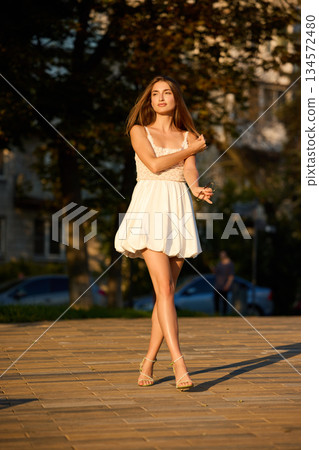 Slavic Woman Walking in Warm Golden Light Slavic Woman Walking in Warm Golden Light 134572480