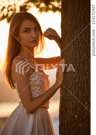 Slavic Woman in Lace Dress by Tree Slavic Woman in Lace Dress by Tree 134572487