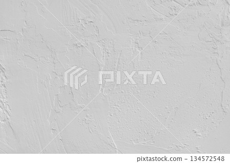 Close up white colored painted plaster wall surface background with rough brushstrokes texture Close up white colored painted plaster wall surface background with rough brushstrokes texture 134572548