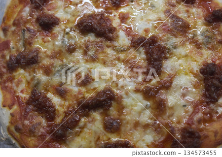 cheese and tomato pizzas as italian food 134573455