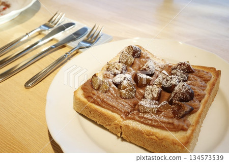 A breakfast image of chestnut and marron toast, full of autumn flavors. A breakfast image of chestnut and marron toast, full of autumn flavors. 134573539