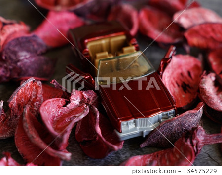A red background miniature car creates an adult image cut A red background miniature car creates an adult image cut 134575229