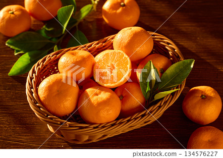 Tangerines in a basket 134576227