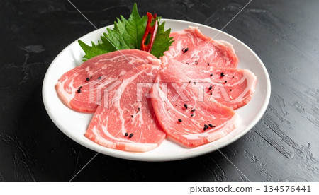 Pork slices on the plate for the shabu Pork slices on the plate for the shabu 134576441