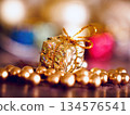 Golden glitter and gold Christmas decorations 134576541