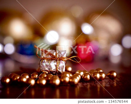 Christmas presents placed on top of sparkling lights Christmas presents placed on top of sparkling lights 134576544