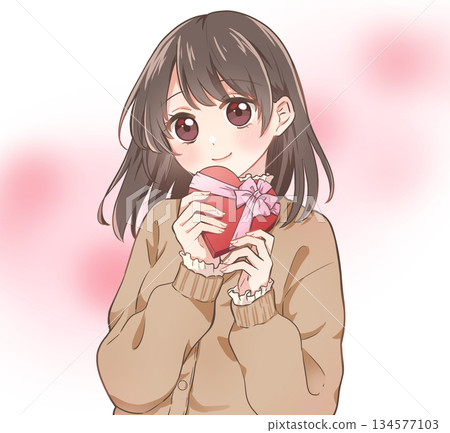 Valentine's Day girl holding a heart-shaped box of chocolates, smiling 134577103