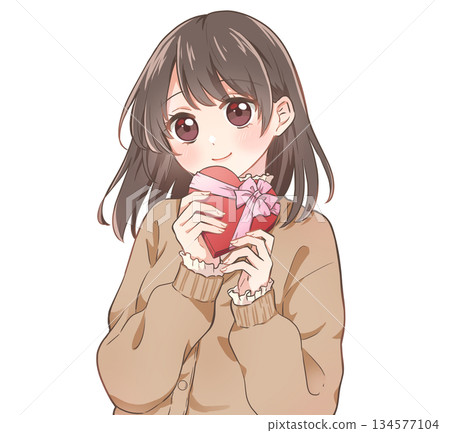Valentine's Day girl holding a heart-shaped box of chocolates, smiling 134577104