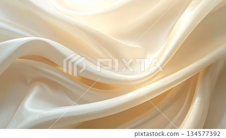 Luxurious golden silk fabric background featuring soft satin waves and a smooth shiny texture with elegant drapery curves for a high-fashion textile backdrop Luxurious golden silk fabric background featuring soft satin waves and a smooth shiny texture with elegant drapery curves for a high-fashion textile backdrop 134577392