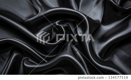 Elegant black satin fabric texture featuring smooth luxury silk waves and a shiny rippled drapery material for a sophisticated fashion background Elegant black satin fabric texture featuring smooth luxury silk waves and a shiny rippled drapery material for a sophisticated fashion background 134577519