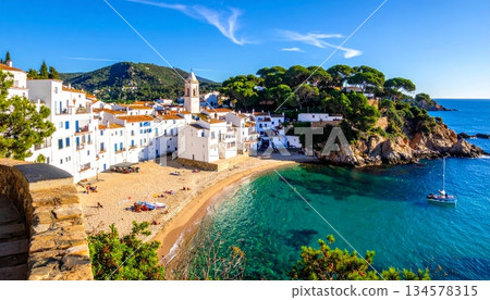 A breathtaking Mediterranean landscape view of the historic coastal city of Dubrovnik Croatia reveals stunning European architecture and a bustling summer harbor port nestled along the blue sea 134578315