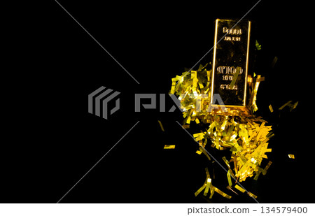 Gold Bar float in mid air with element Confetti foil. Gold bar standard is bank reserve to finance economic wealth and money saving. black background isolated Gold Bar float in mid air with element Confetti foil. Gold bar standard is bank reserve to finance economic wealth and money saving. black background isolated 134579400