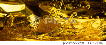 Gold bitcoin cryptocurrency coin create in liquid gold with trust. Golden bitcoin mining from gold and casting into bitcoin coin shape for credit trust new money, crown water liquid Gold bitcoin cryptocurrency coin create in liquid gold with trust. Golden bitcoin mining from gold and casting into bitcoin coin shape for credit trust new money, crown water liquid 134579402