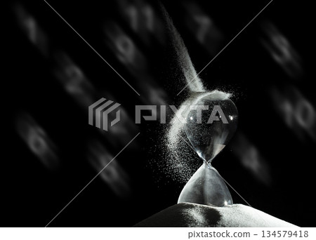 Hourglass add more sand of time on white sand over black background. White hourglass show more time Deadline extended time management hope concept hour glass, life clock passing by 134579418