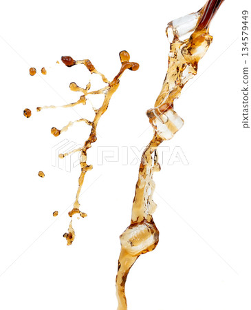 Coffee drink water mix ice cube fall pouring down in Shape form line of espresso black coffee splashes into drop soda cola attack fluttering in air, stop motion freeze shot. Splash coffee cola drink Coffee drink water mix ice cube fall pouring down in Shape form line of espresso black coffee splashes into drop soda cola attack fluttering in air, stop motion freeze shot. Splash coffee cola drink 134579449