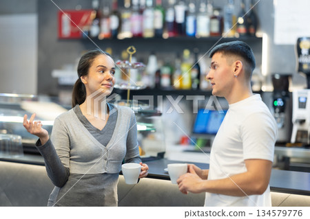 Couple is having nice conversation during coffee break 134579776