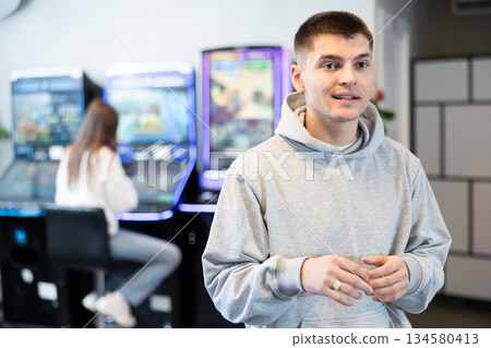 Surprised guy visits slot machine room for first time Surprised guy visits slot machine room for first time 134580413