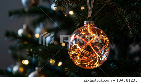 A Christmas ornament suspended mid-air 134581233