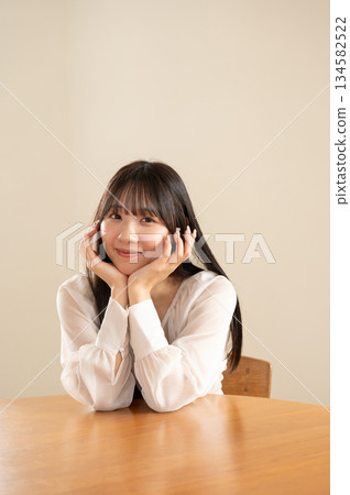 A lady with a cheeks stick A lady with a cheeks stick 134582522