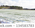 Photographing the snow-covered autumn wheat fields in Otobe, Hokkaido in winter 134583783