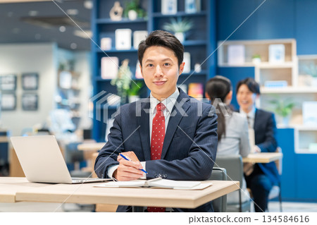 Middle-aged businessman working in the office 134584616