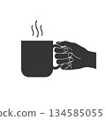 Silhouette icon of a hand holding a mug 134585055