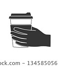 Silhouette icon of a hand holding a takeaway cup 134585056