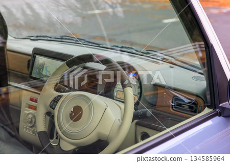 A scene of a woman in her 20s driving a car (no face) A scene of a woman in her 20s driving a car (no face) 134585964